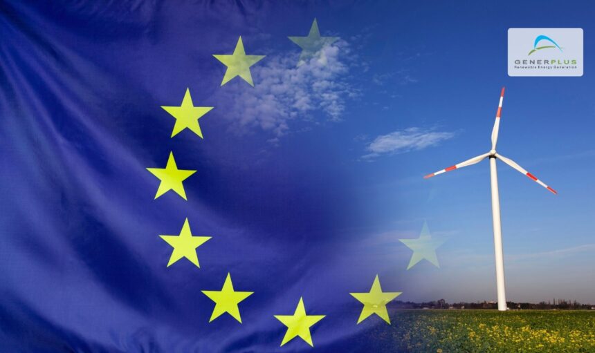 la bandiera dell'Unione Europea campeggia a fianco di una pala eolica